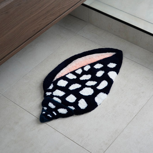 Tapis coquillage cone