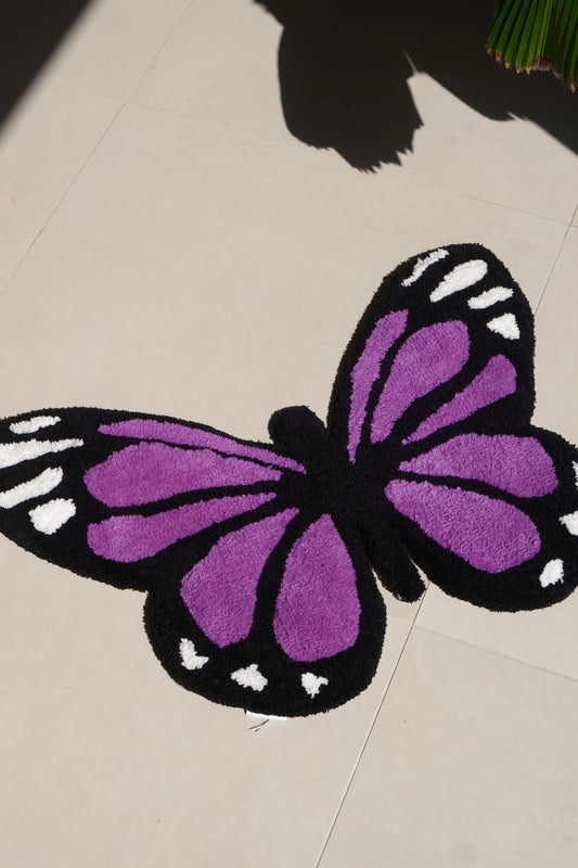 Tapis papillon mauve