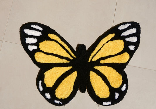 Tapis papillon jaune